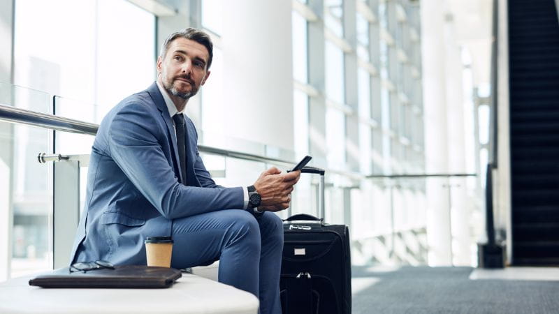 Businessman using mobile phone